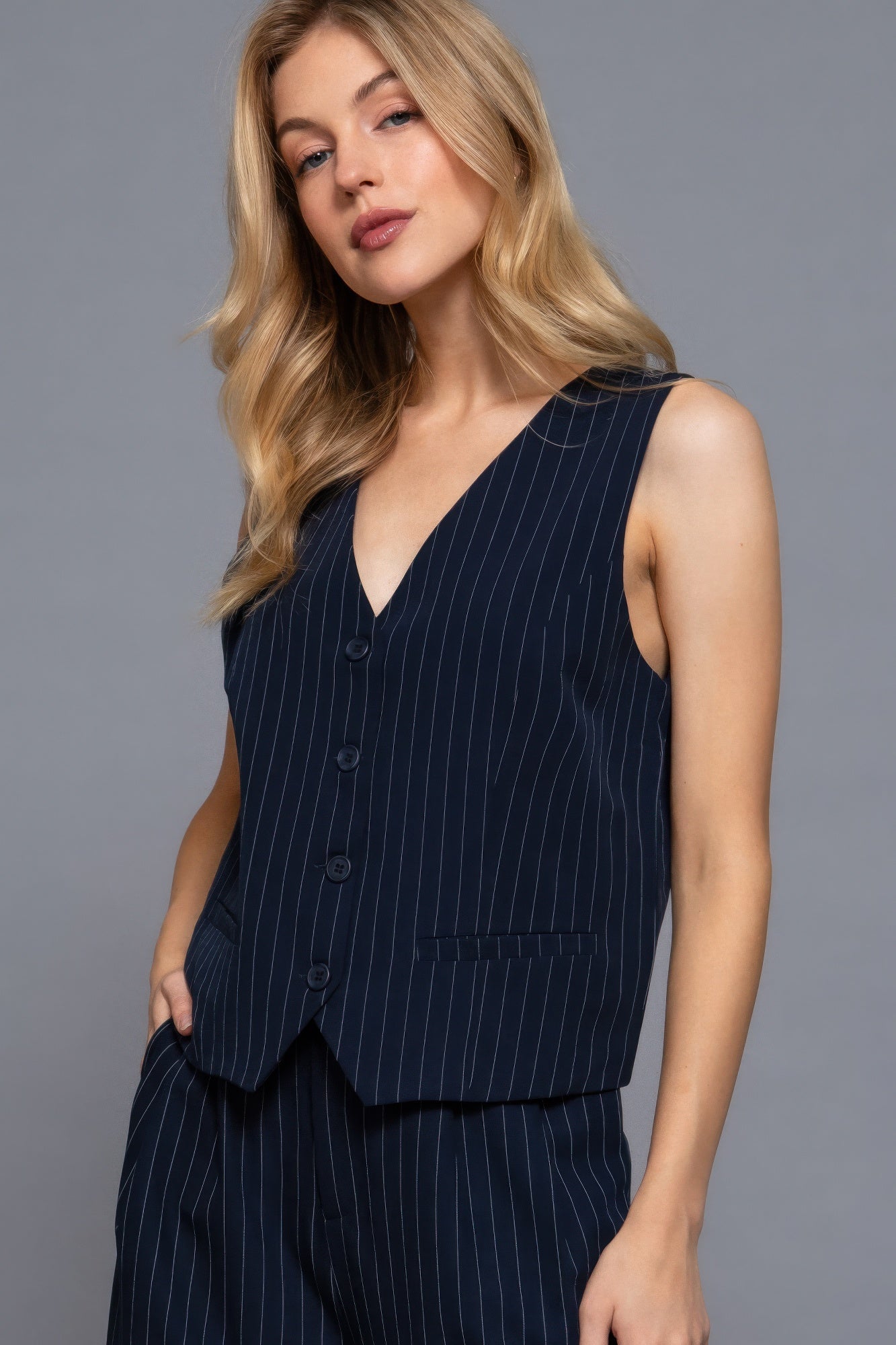 Navy pinstripe V-neck woven vest, front button placket and chest pocket
