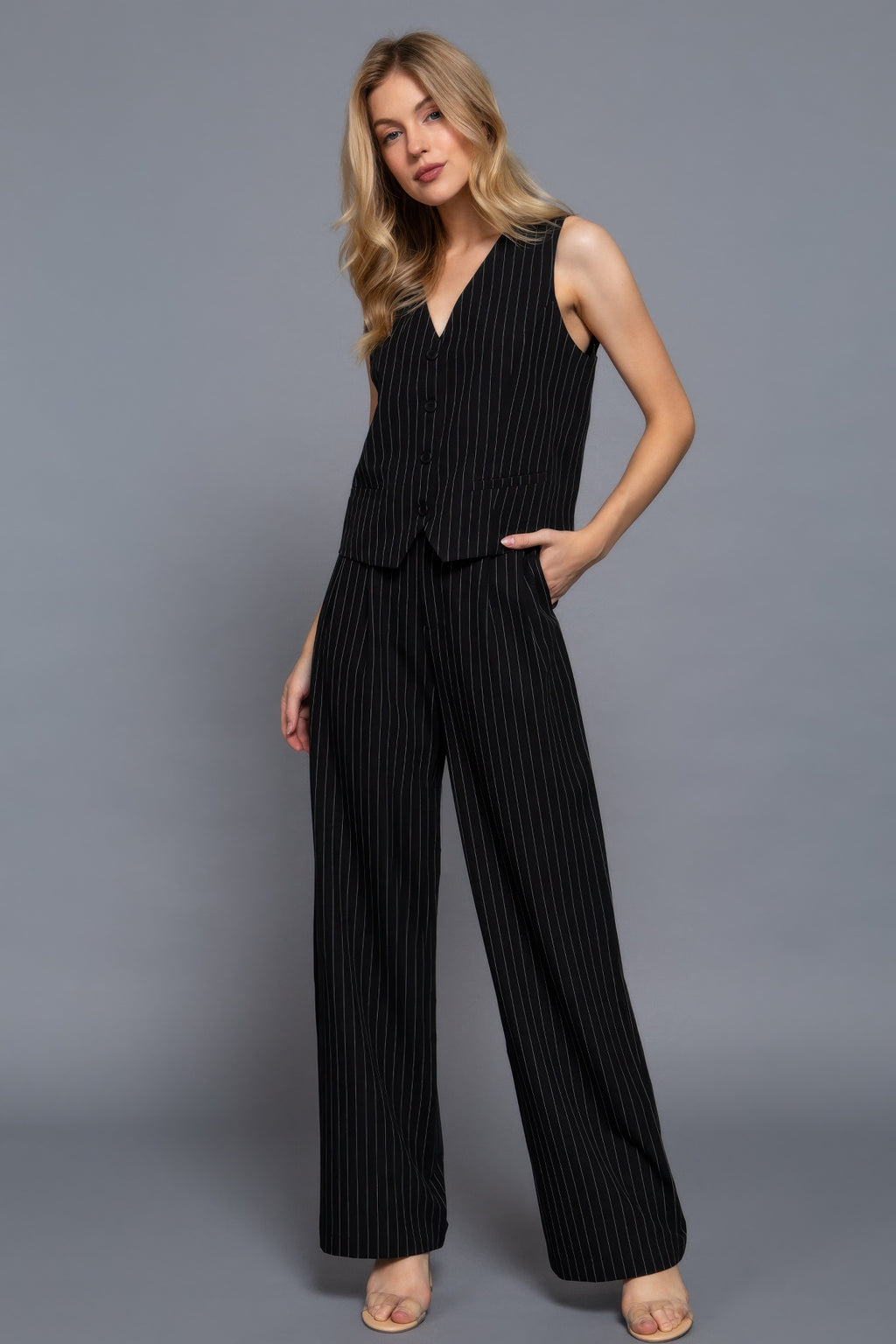 Black pinstripe V-neck vest with button front and wide-leg matching look