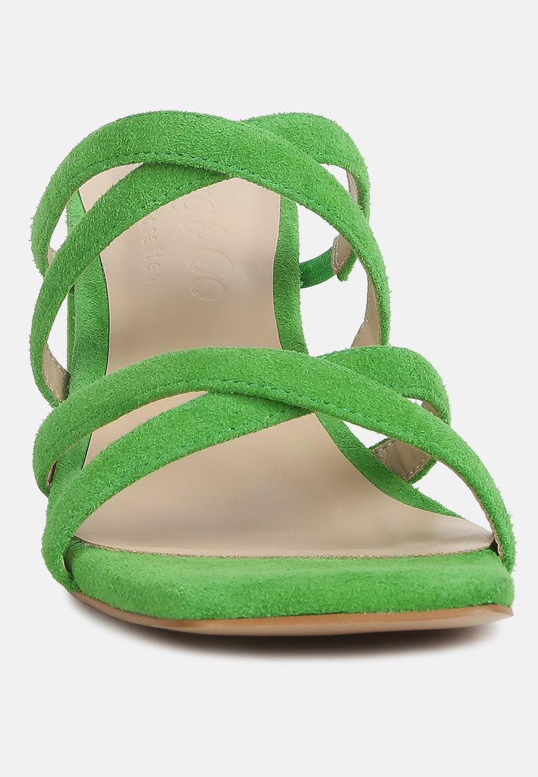 Mint green strappy block-heel sandals with crossed straps and open toe