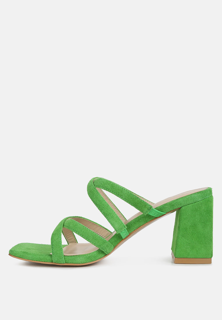 Mint green block-heel mule sandals with open toe and crisscross straps