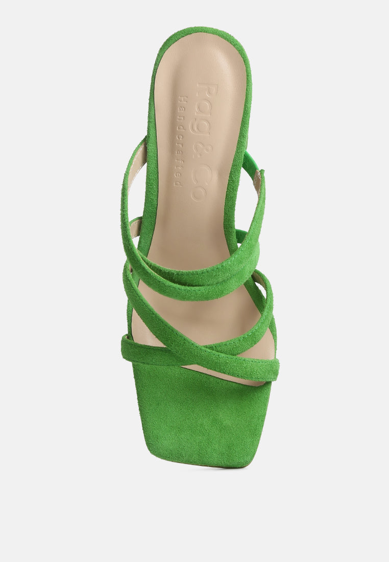 Mint green strappy sandals with open toe and crisscross upper