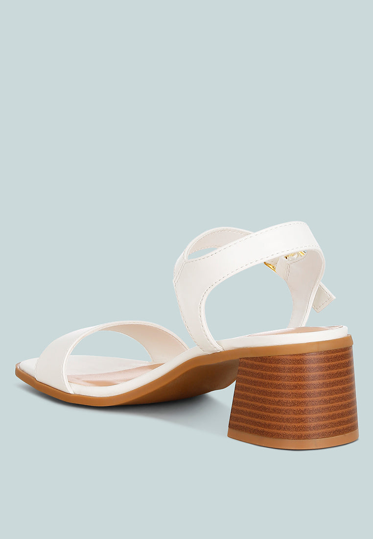 White Varya stacked heel slide sandal, side view, chunky stacked heel