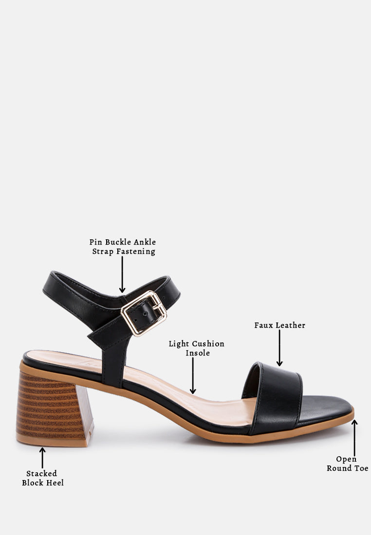 Black faux-leather stacked block heel sandal with pin-buckle ankle strap