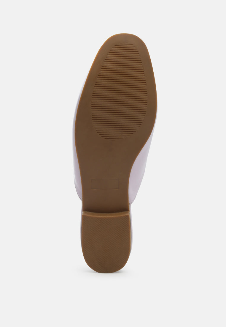 Vasiliki faux leather flat mules—underside view of rubber sole