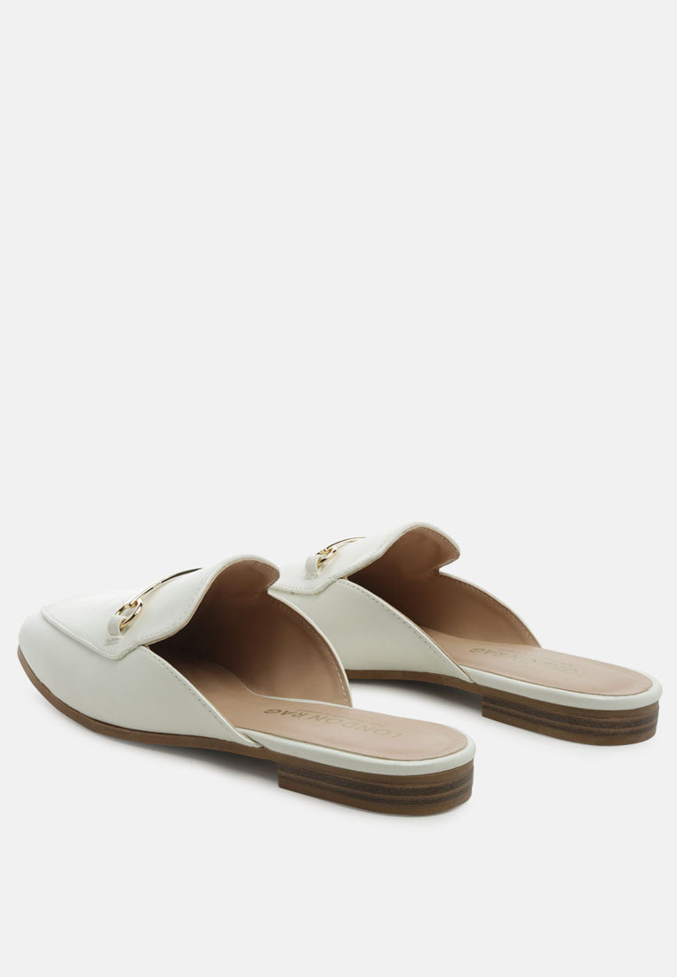 White mule pair view with open vamp and gold-toned horsebit strap