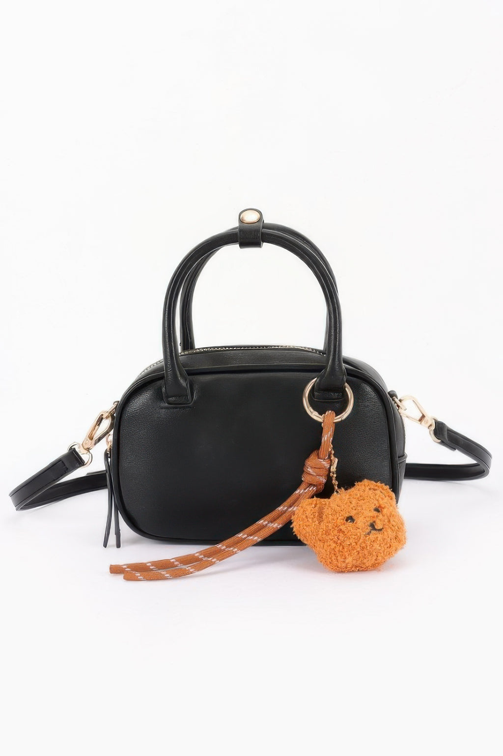 Vegan leather mini bowling bag in black with bear charm and crossbody strap