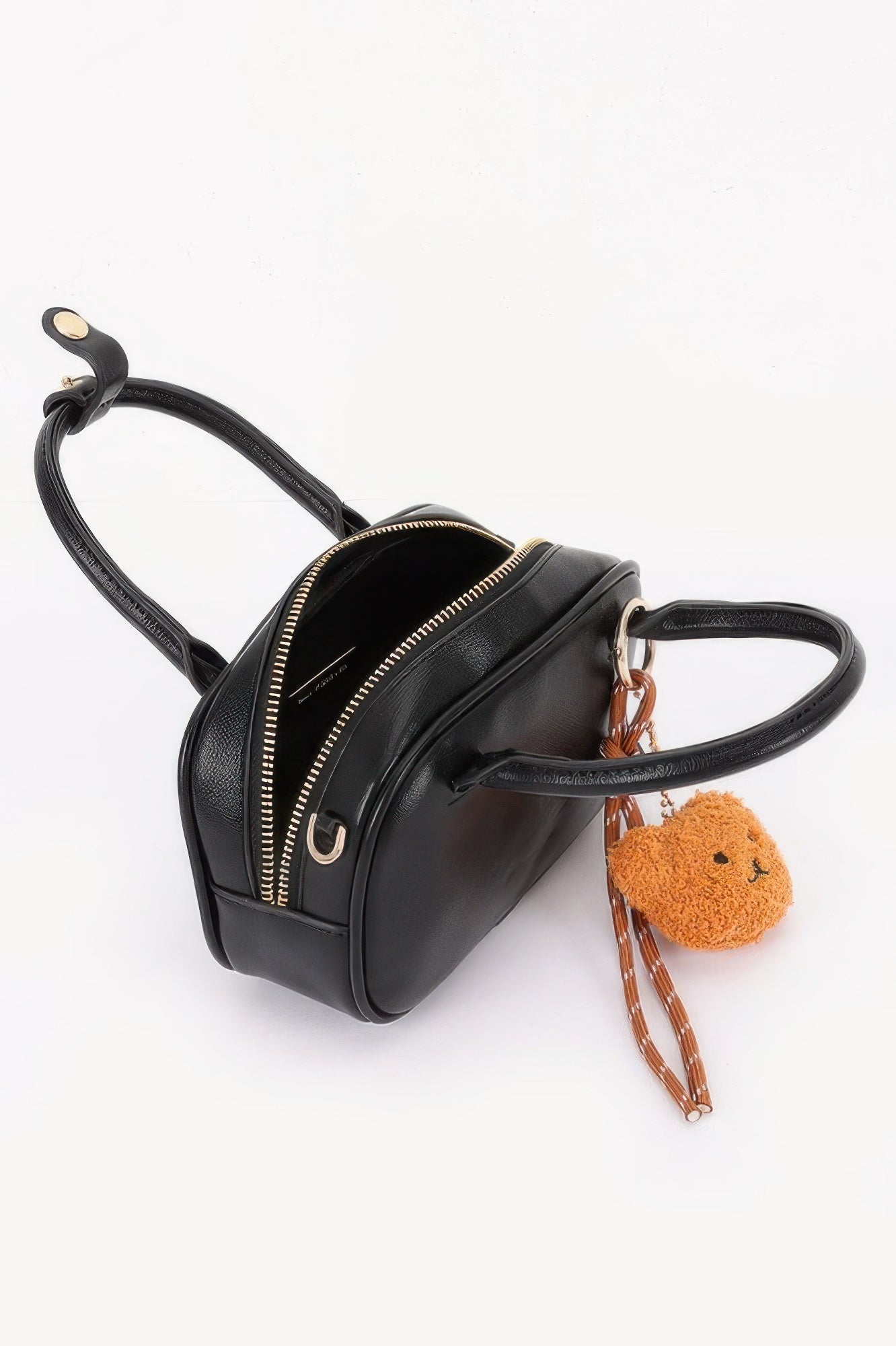 Black vegan mini bowling bag with zipper pocket, bear charm keychain, crossbody strap