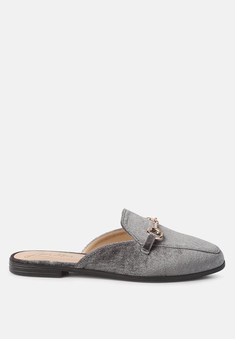 Grey velvet flat mule with gold-tone buckle detail and closed toe