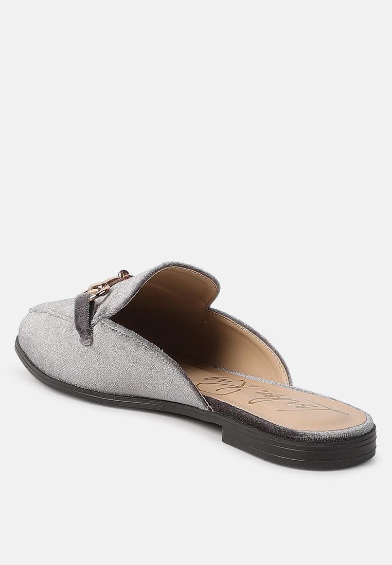 Grey velvet mule showing interior and flat rubber sole
