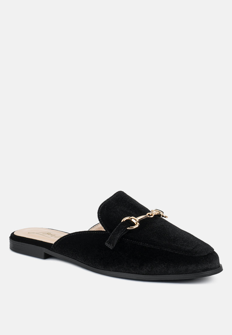Black velvet mule angled side view with gold-tone buckle detail