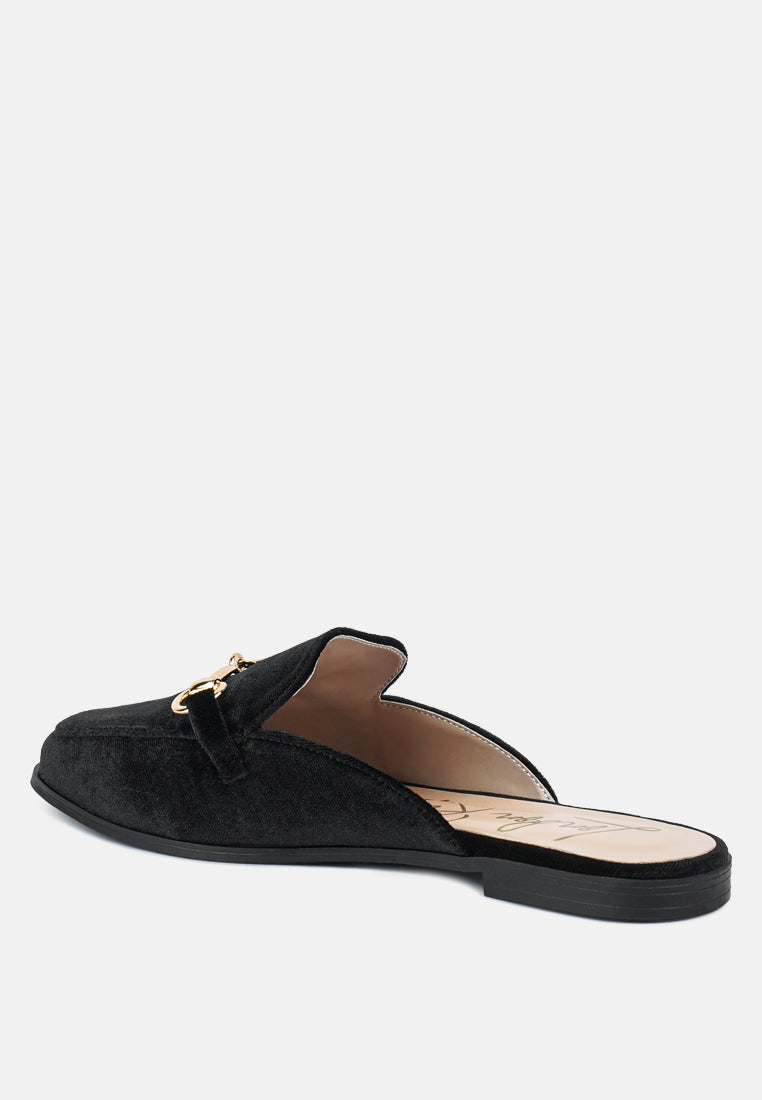 Black velvet mule with open side profile and flat rubber sole