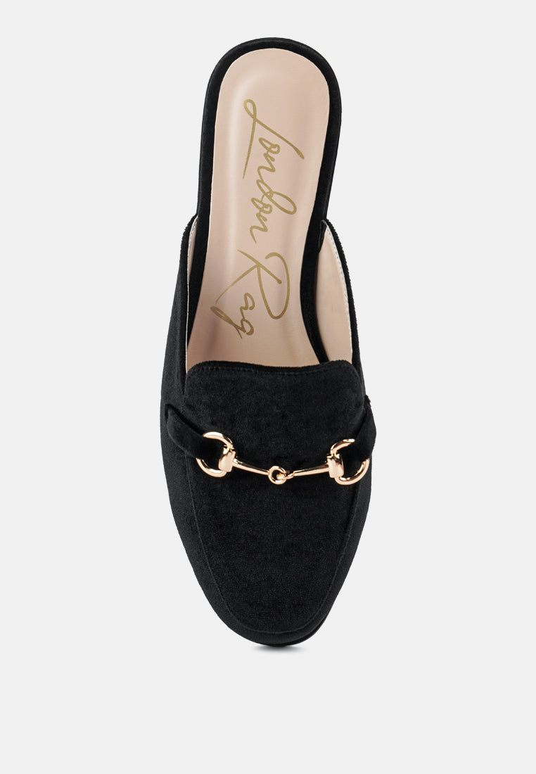 Black velvet mule front view with gold-tone buckle and cushioned footbed