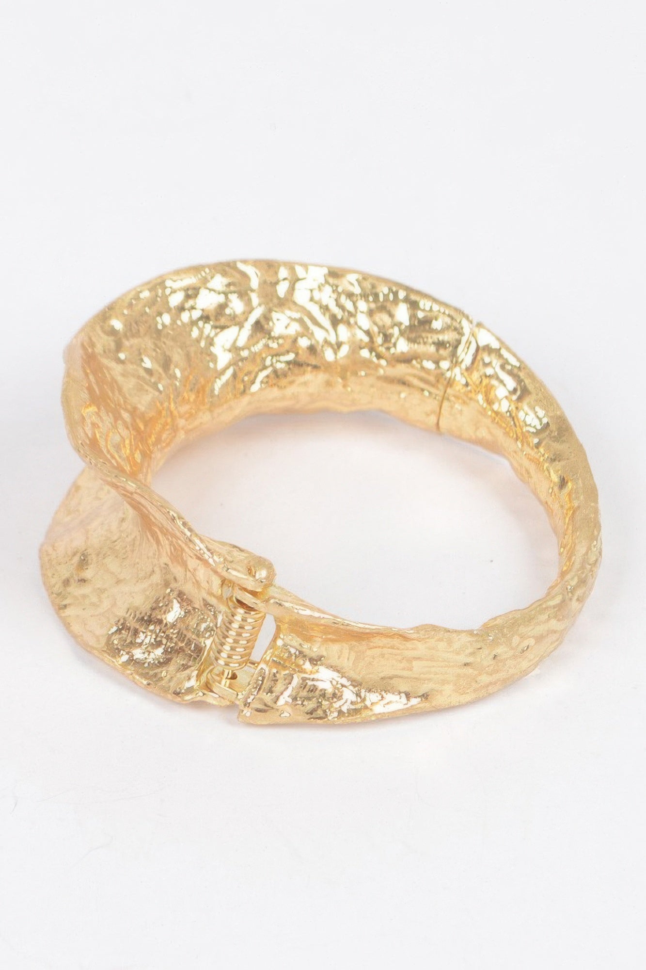 Vintage gold cuff bracelet, open circular shape with etched, reflective surface