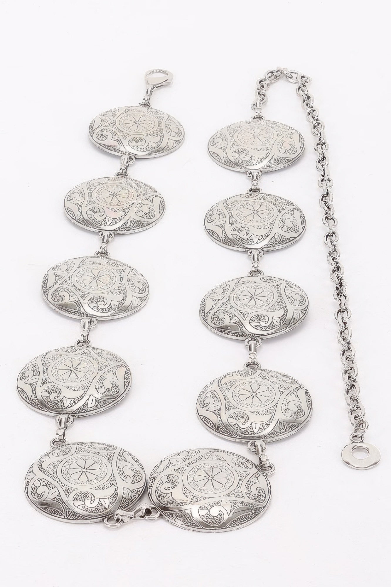 Silver-tone vintage coin chain belt links with detailed engraved oval medallions