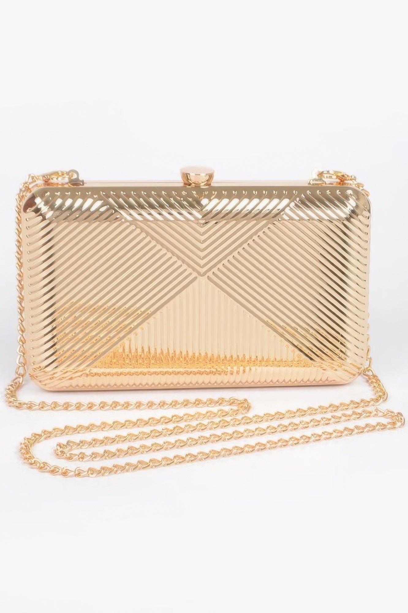 Vintage metal clutch bag in gold with chevron ribbed front and chain strap