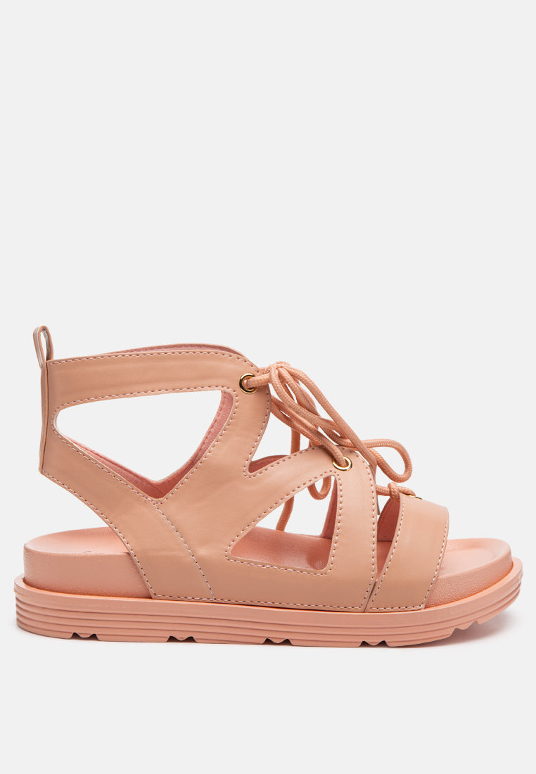 Voopret Tie-Up Flat Sandals in pink with lace-up straps and cutout upper