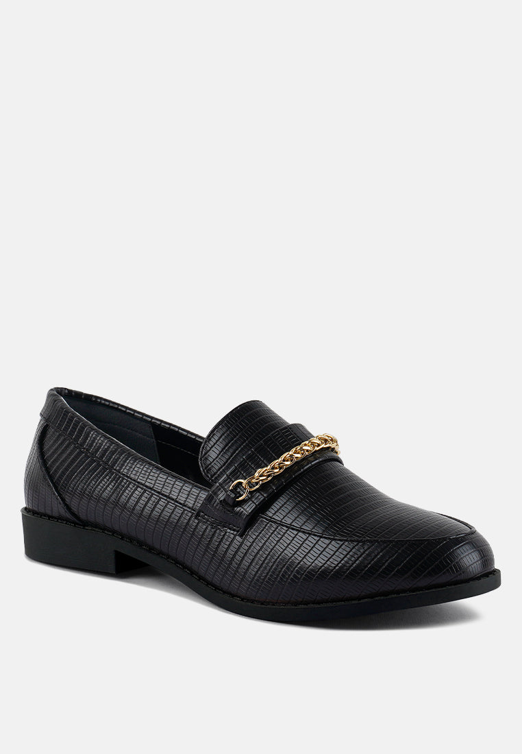 Black loafers with croc-textured upper, gold chain accent, and low block heel