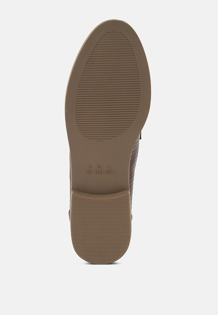 Nude low block loafers with golden chain detail and textured finish