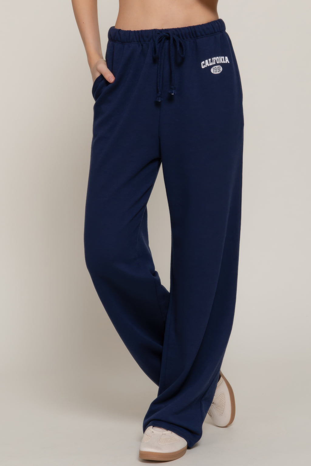 True navy waistband print detail sweatpants with drawstring tie and relaxed fit legs