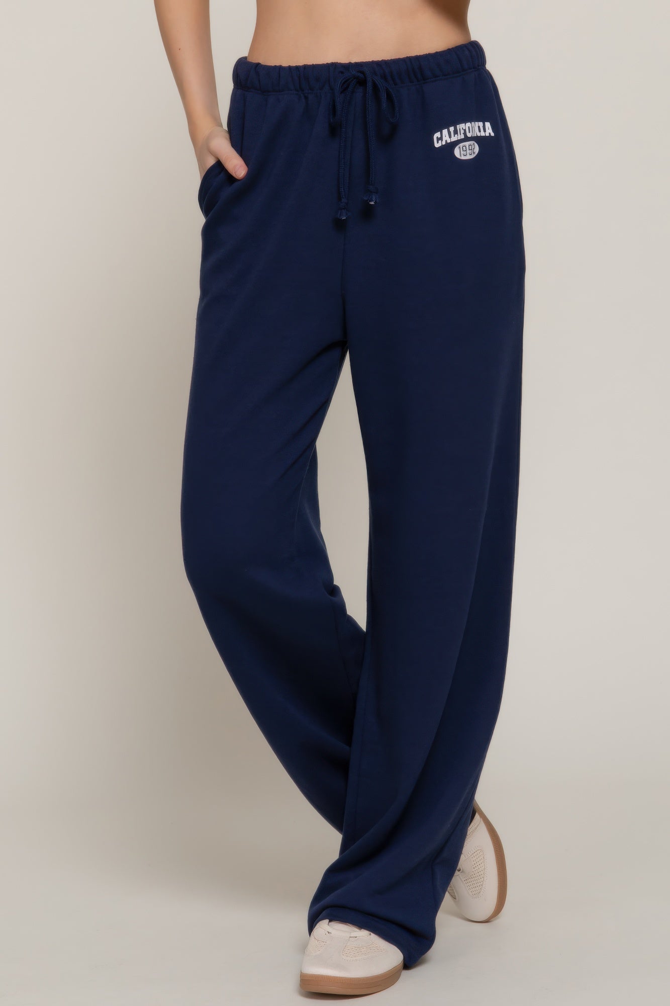 True navy waistband print detail sweatpants with drawstring tie and relaxed fit legs