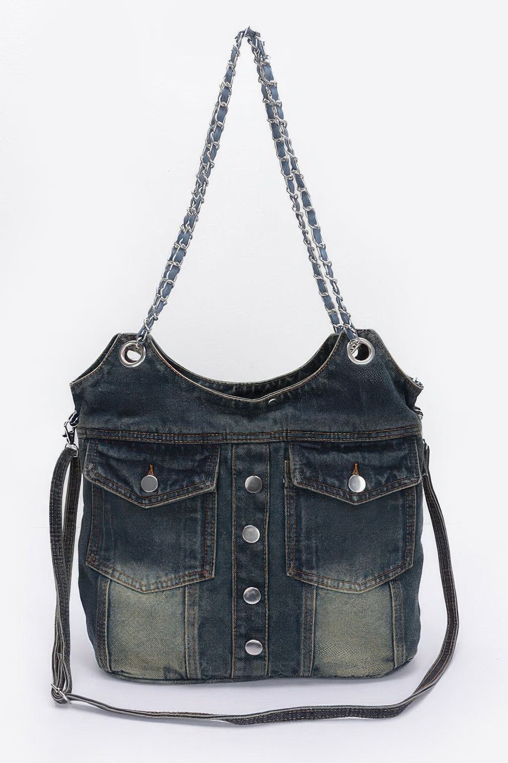 Washed denim tote bag with double front pockets, snap buttons, and chain handles