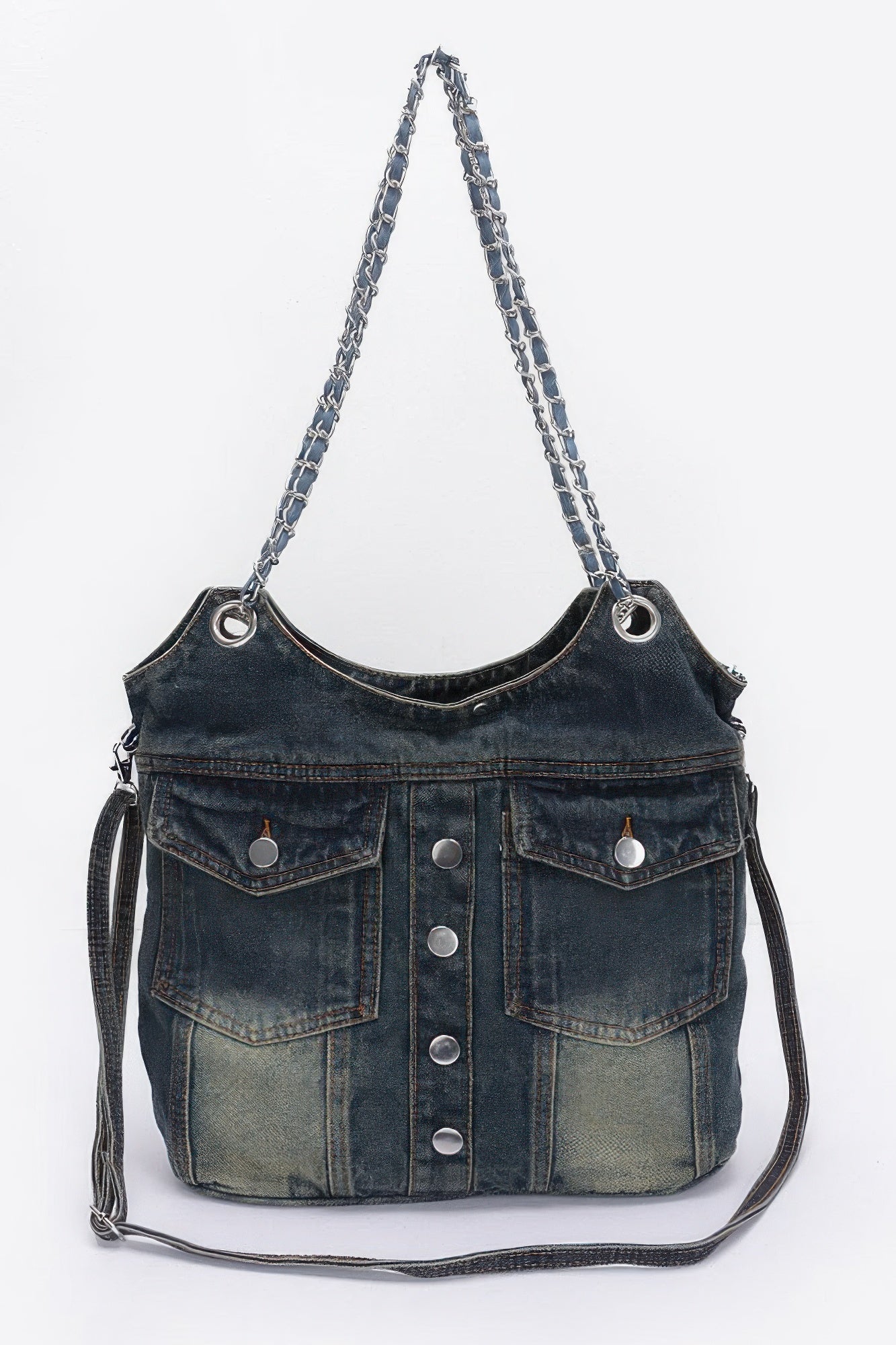 Washed denim tote bag with double front pockets, snap buttons, and chain handles