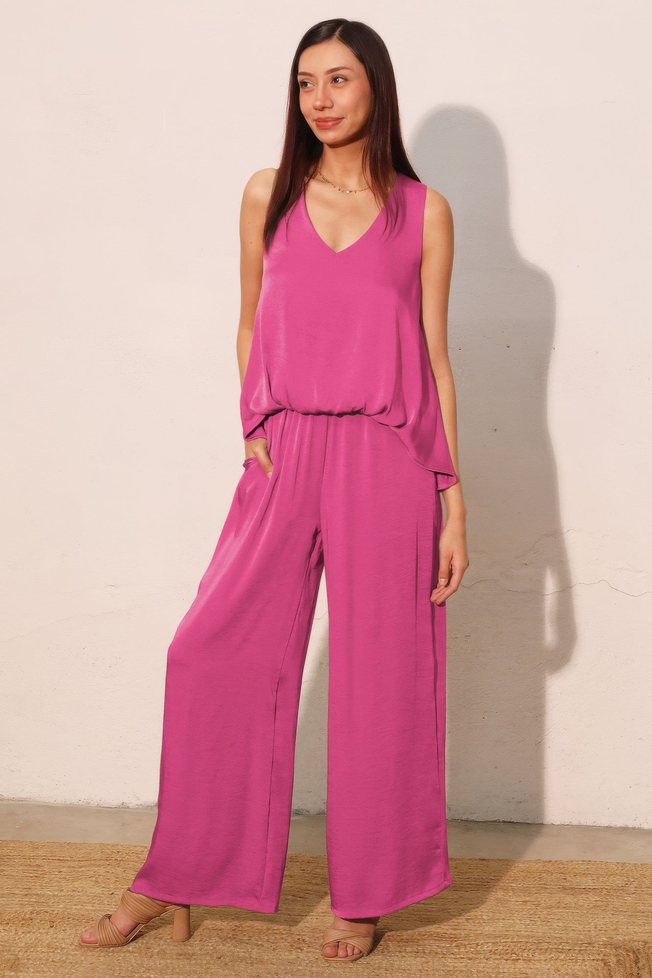 Washed poly silk front tucked top, pink V-neck and draped front, side view