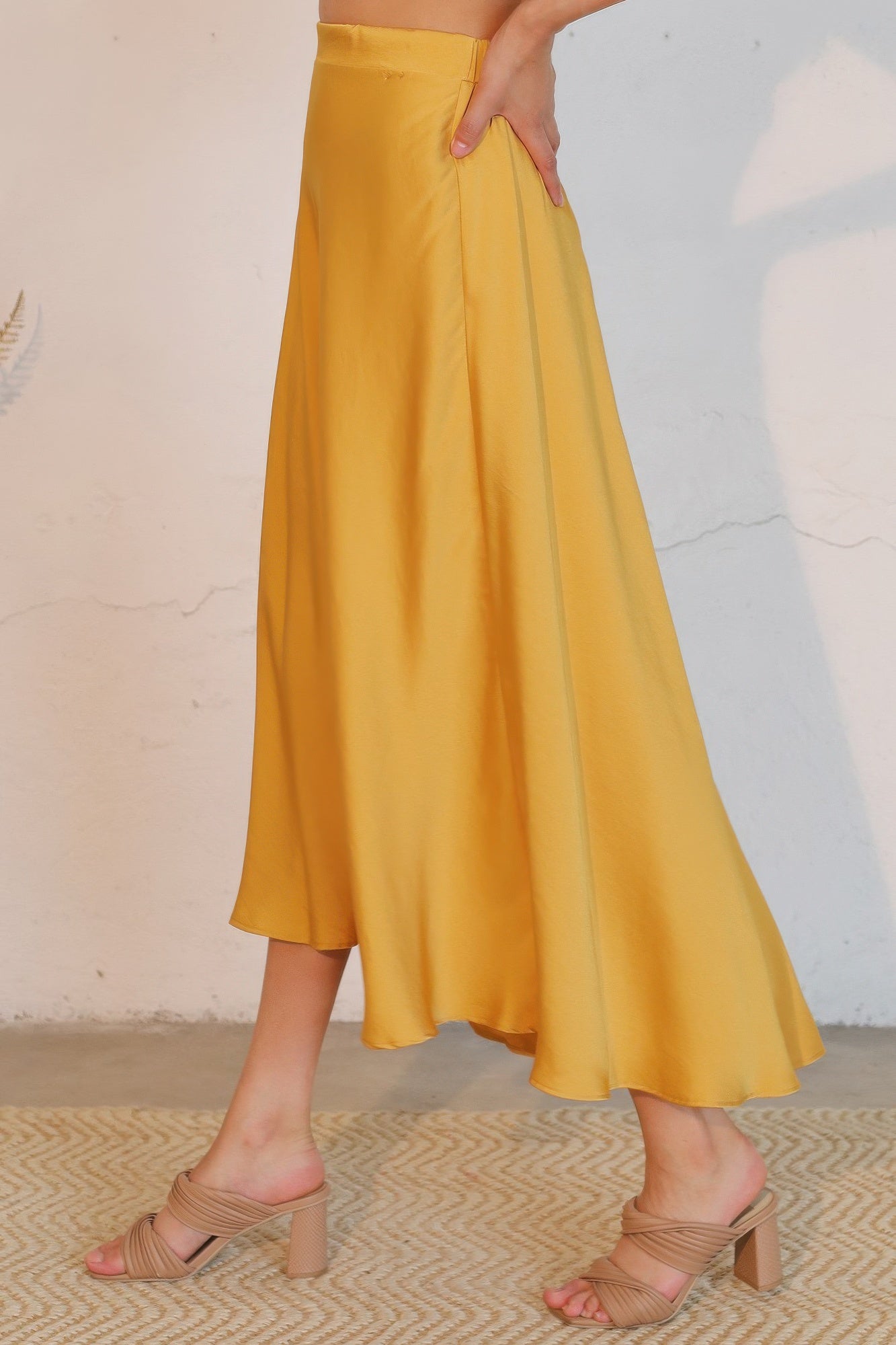 Washed poly silk midi swing skirt in mustard yellow, flowing A-line drape