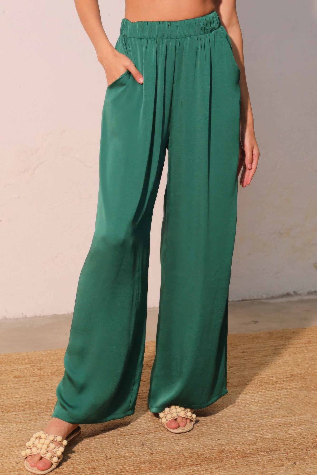 Washed poly-silk pocket pants, dark green with elastic waist and wide legs