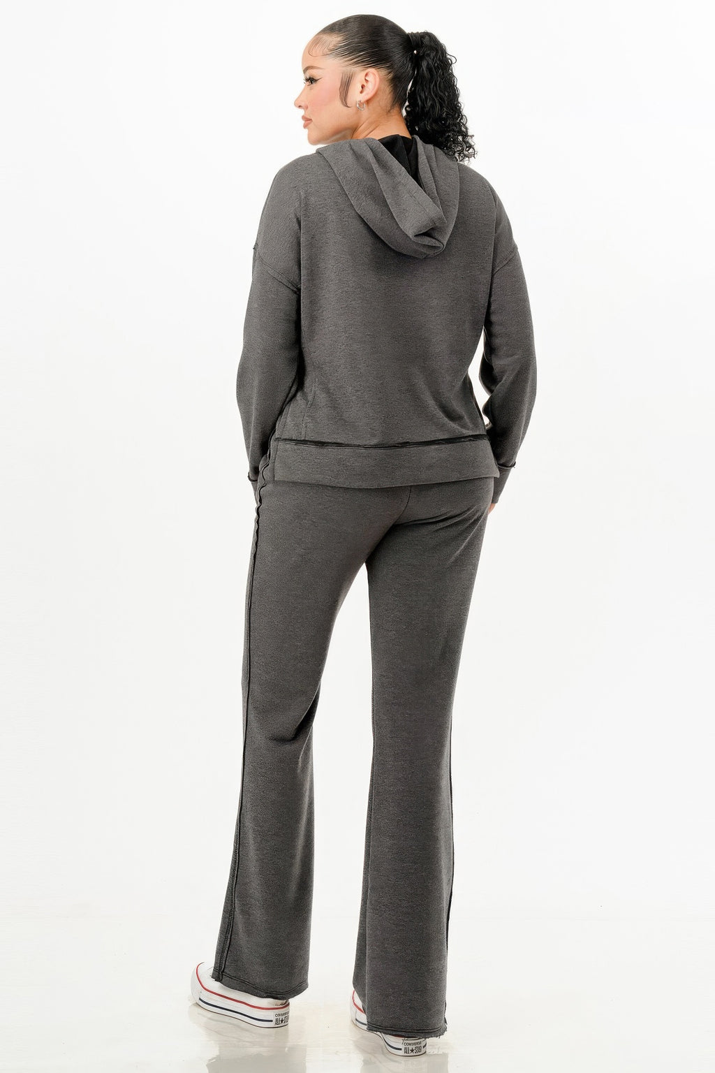 Charcoal two-piece set, back view: pullover hoodie with hood and flare sweatpants