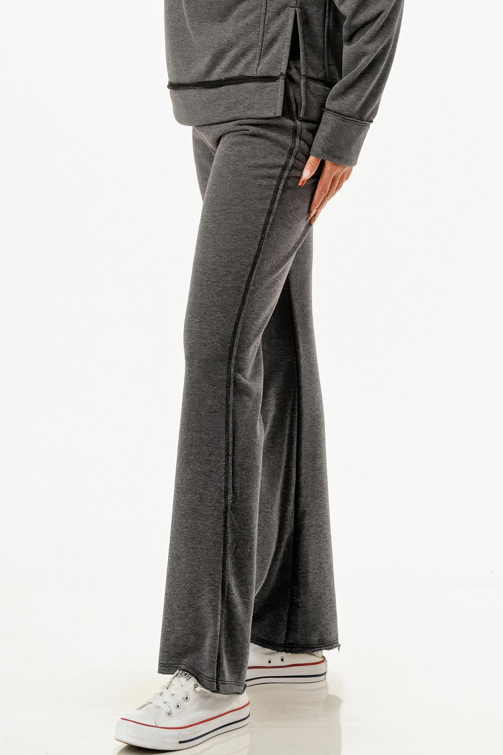 Charcoal sweatpants detail: wide flare legs with side slit hem