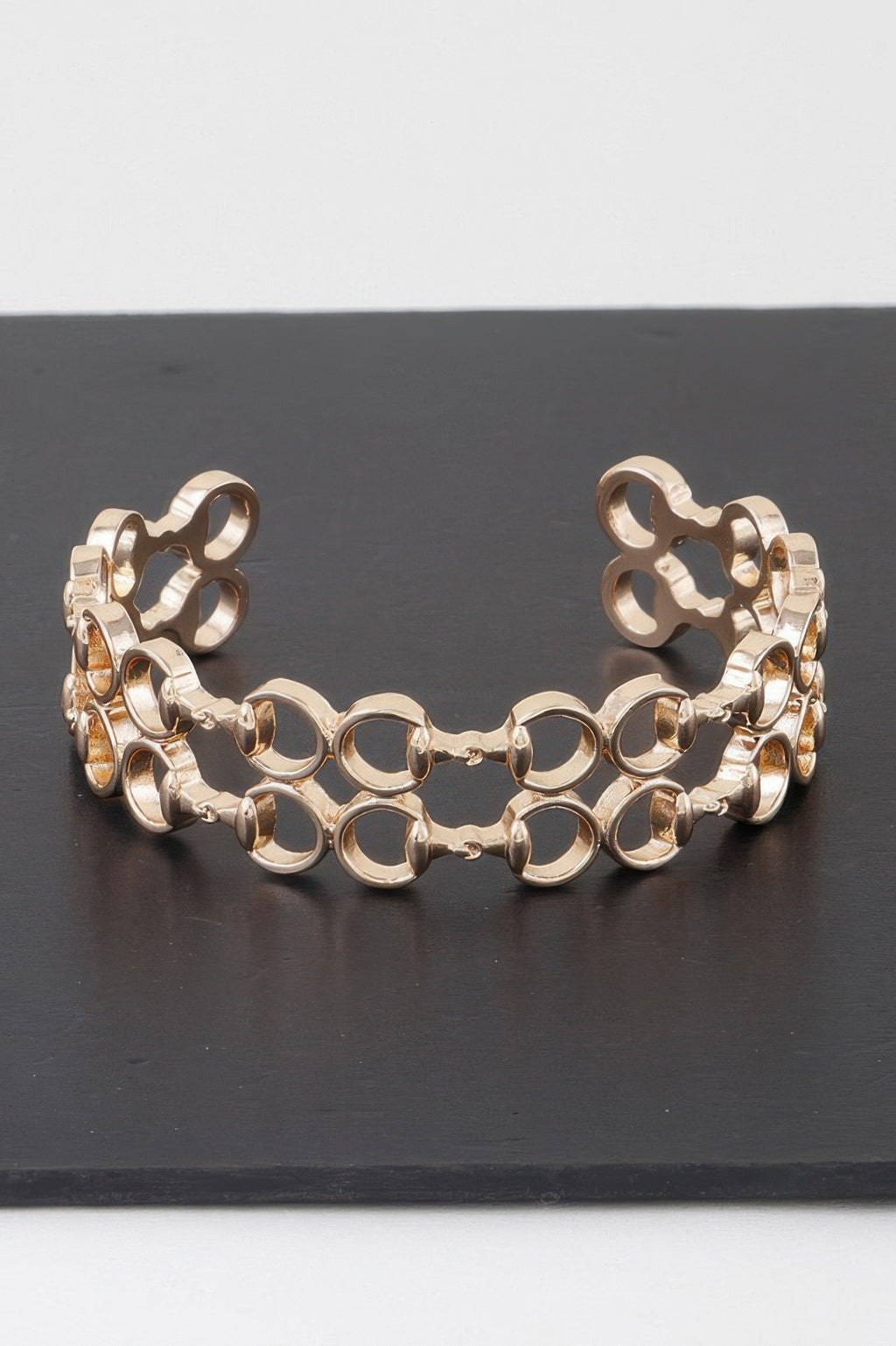 Gold welded ring chain cuff bracelet with openwork round links