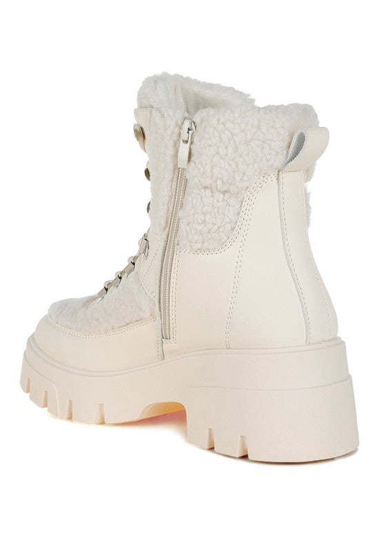Beige faux-fur hiker boots with back zipper and chunky outsole