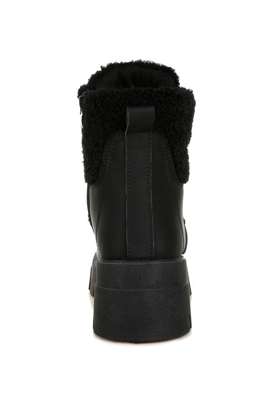 Black faux-fur hiker boot with back zipper and chunky heel sole