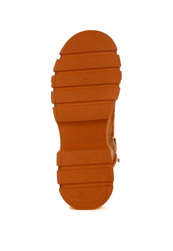 Chunky hiker boot outsole tread, brown rubber sole