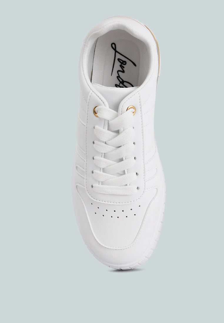 White lace-up sneakers with cushioned collar and script logo inside