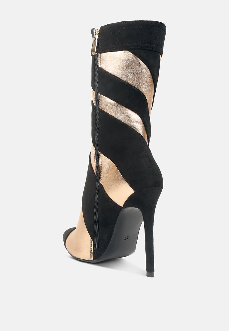 Black stiletto ankle boots with side zipper and crisscross strap panels