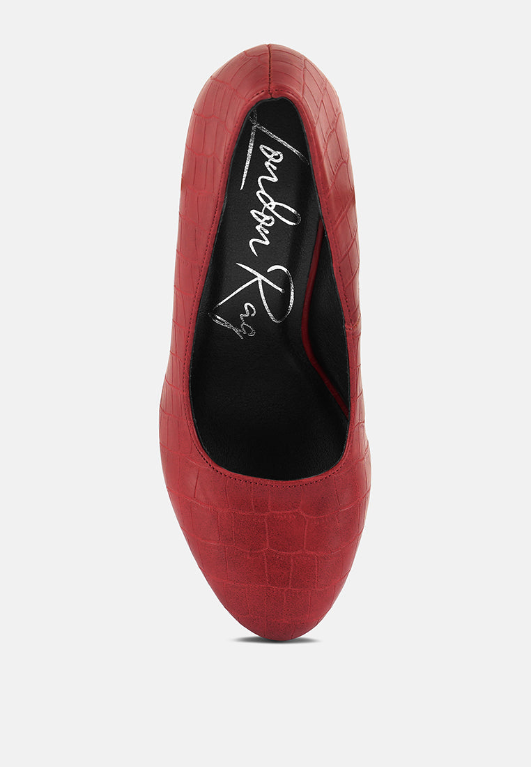 Red croc-texture high block heel pumps with black interior and embroidered logo detail.