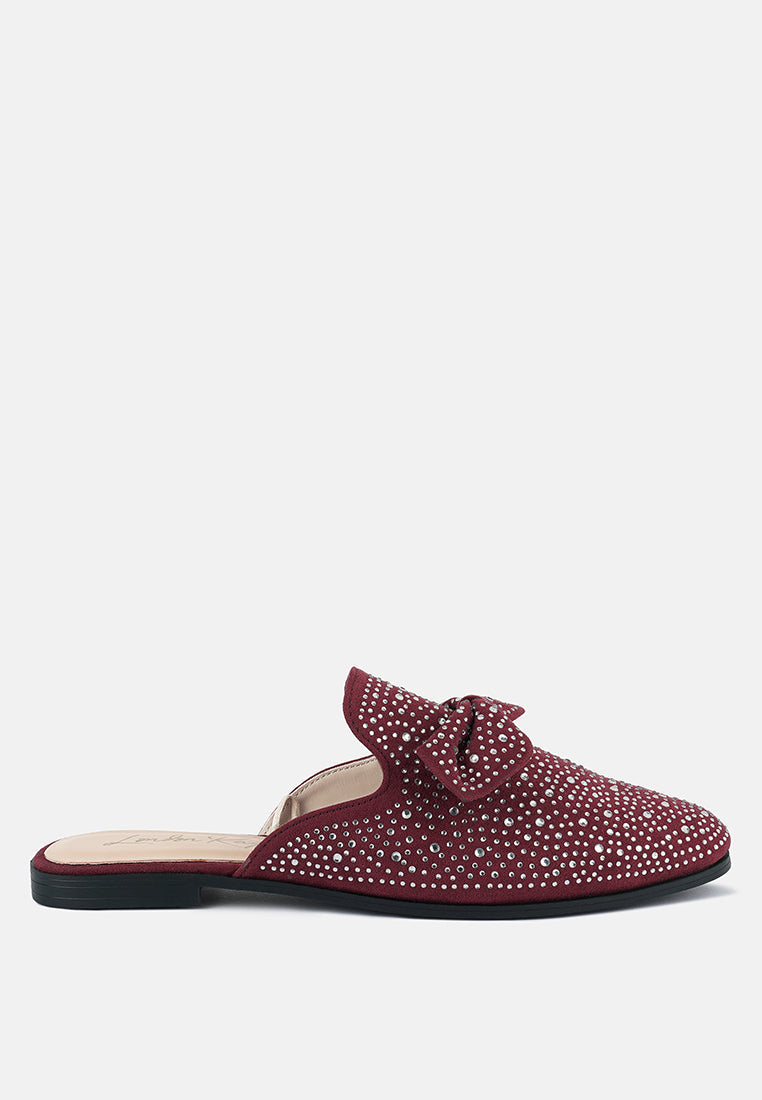 Red embellished bow mule with rhinestone dots, closed round toe and low black sole