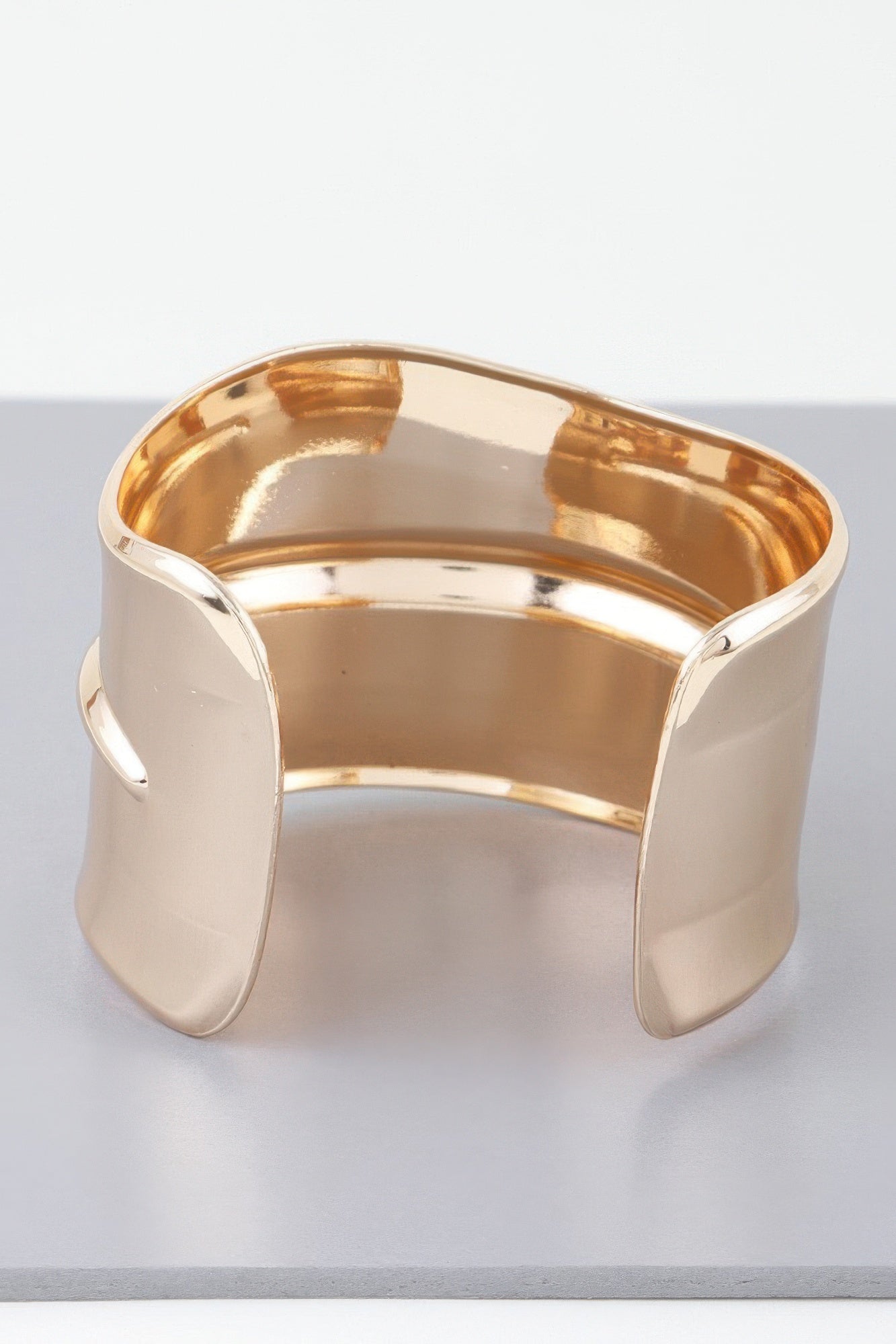 Gold wide shiny rib open cuff bracelet, front view with inner band