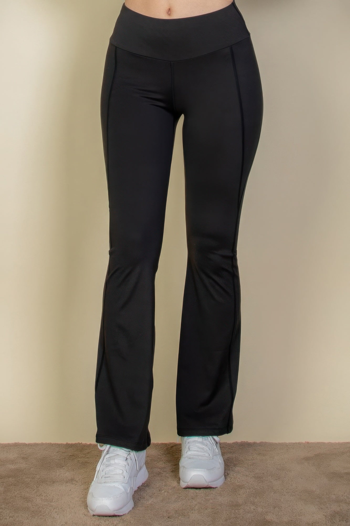 Black wide waistband flare-leg pants, straight-to-flared fit