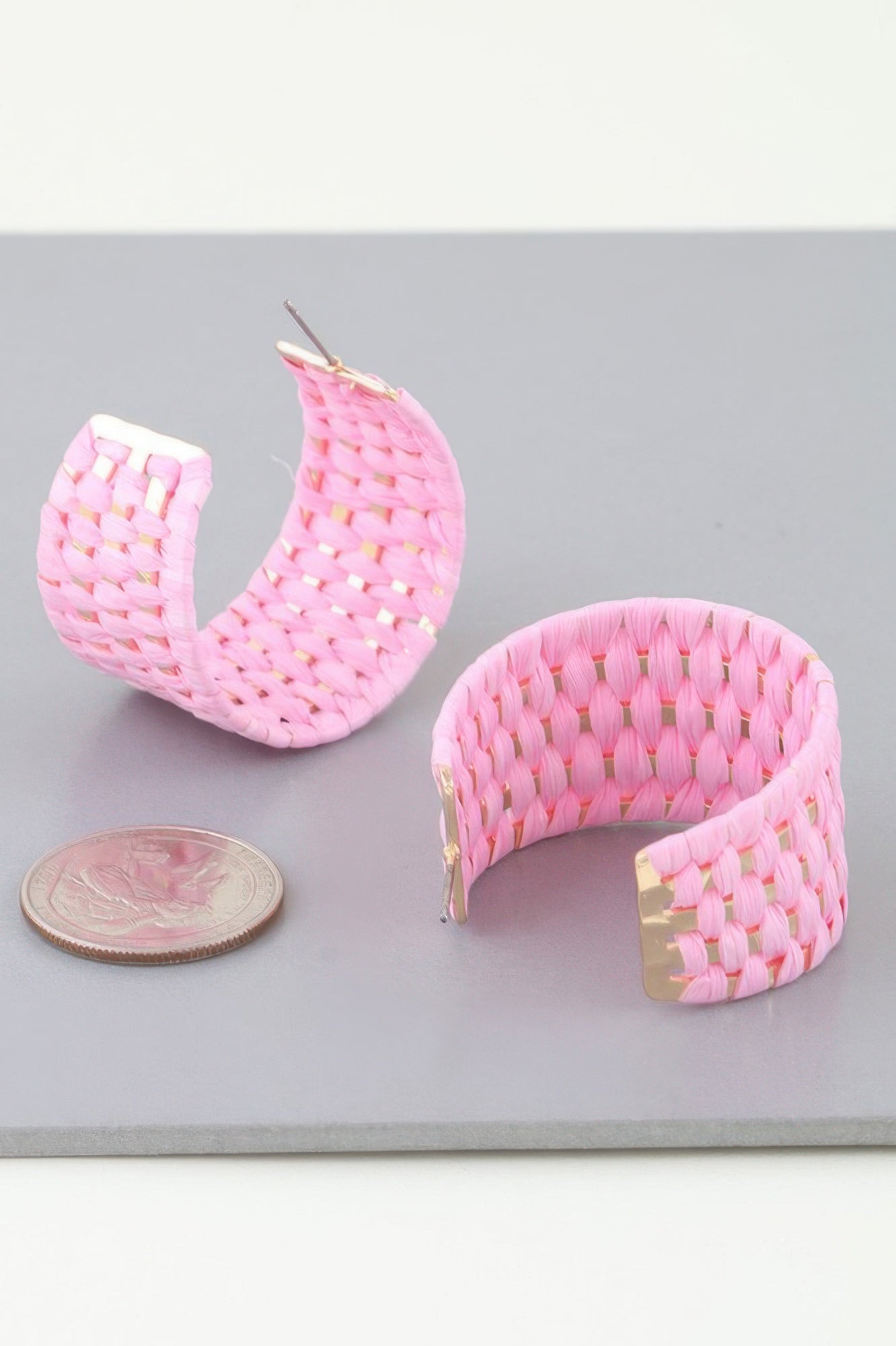 Light pink woven wide hoop earrings, basket weave texture with gold-toned posts