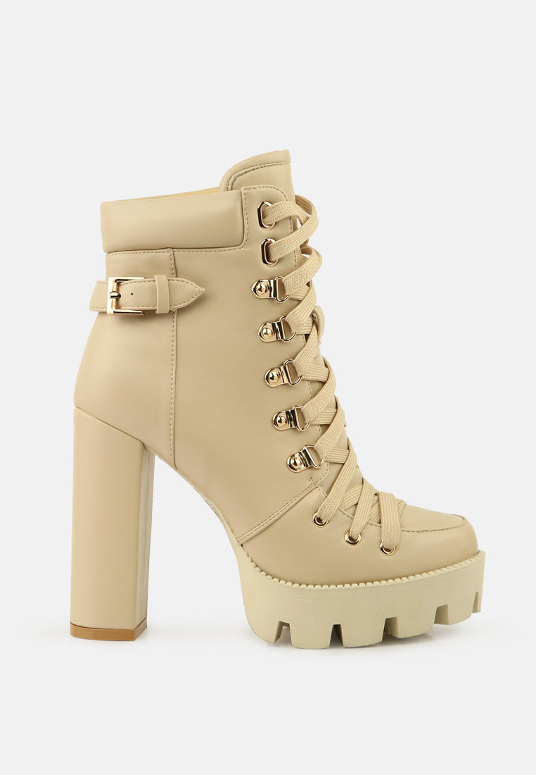 Beige Willow combat boot with lace-up eyelets and side strap, chunky platform heel