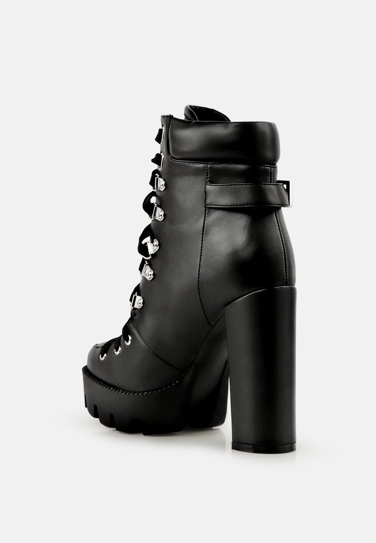Black combat boot back/side view with buckle strap detail and tall block heel