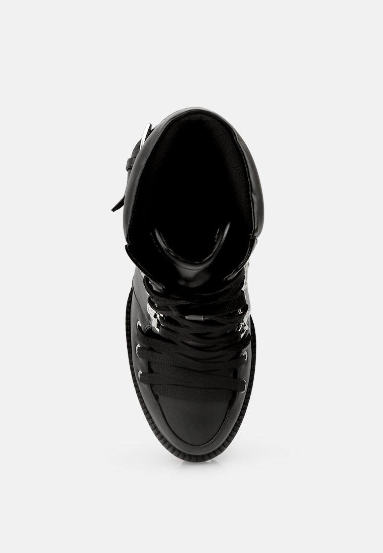 Black combat boot top view with lace-up closure and side pull tab