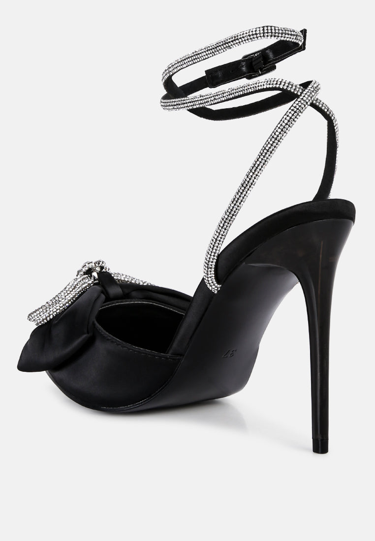 Black high-heel sandals with rhinestone straps and bow at the toe