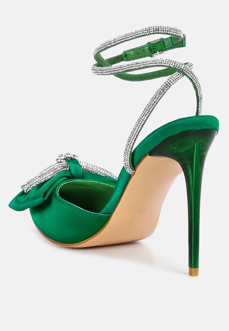 Green high-heel sandals with rhinestone trim straps and bow at the toe