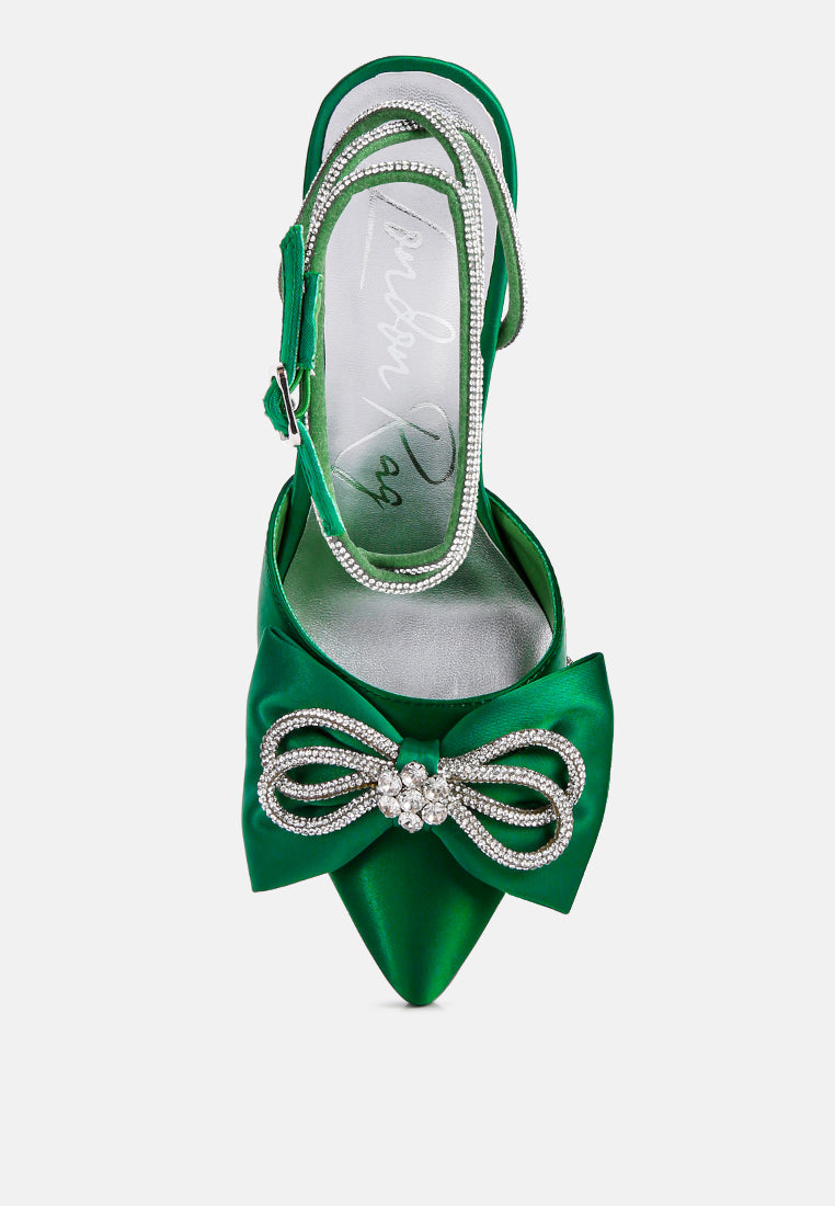 Green pointed-toe high heel sandals with rhinestone bow embellishment