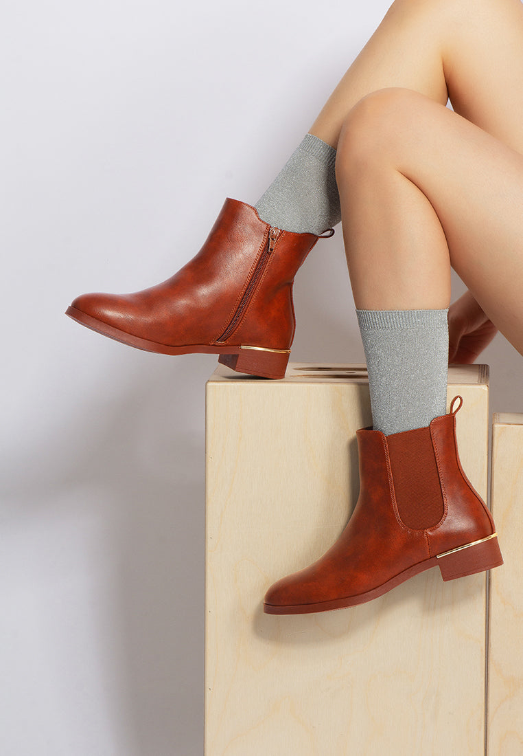 Brown ankle boots with side elastic panels and short block heel