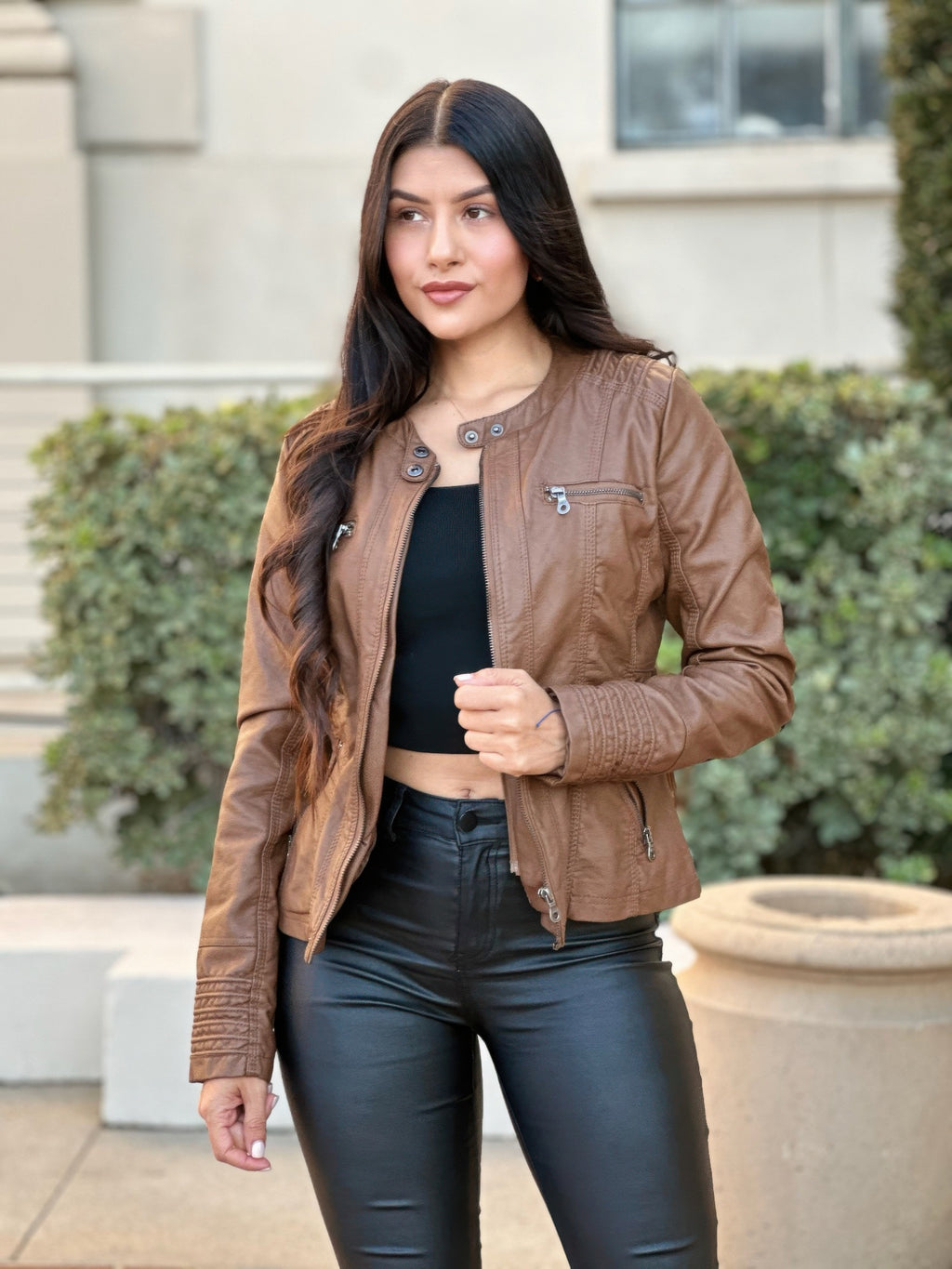 Hooded faux leather jacket in brown with front zip and snap collar, chest pocket